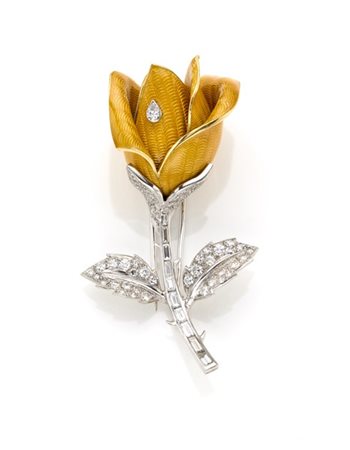 BOUCHERON
Broche a guisa di rosa in oro bianco e giallo con diamanti rotondi e