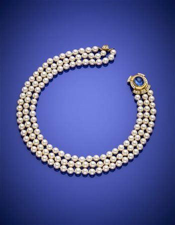 CUSI
Chiusura in oro giallo diamanti e zaffiro cabochon di ct. 10,00 circa a te