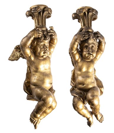 Coppia di putti alati italiani in legno dorato - fine XVII inizio XVIII secolo