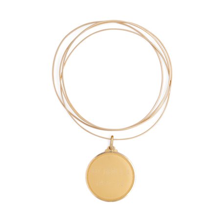 Quattro bracciali rigidi in oro giallo e pendente in oro giallo