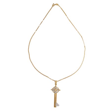 Collana e pendente a chiave in oro e brillanti