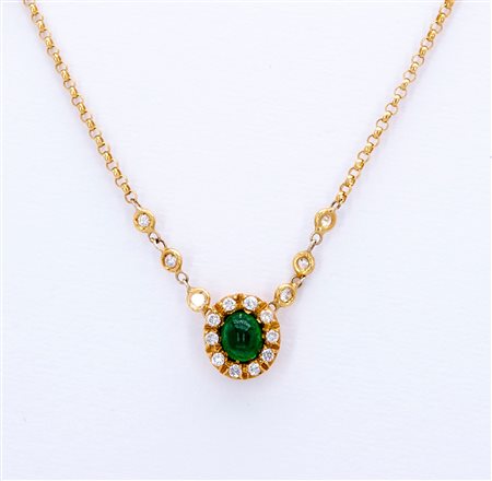 Balestra, pendente in oro, smeraldo e brillanti