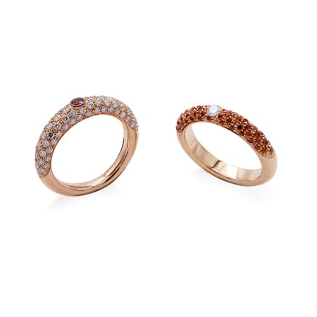 Coppia di anelli in oro giallo con brillanti e granati mandarino