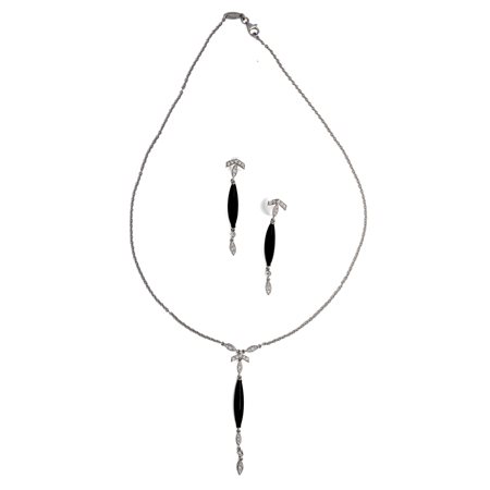 Parure in oro collana e orecchini, brillanti e onice