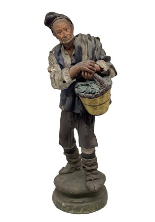 Bongiovanni Vaccaro (Caltagirone 1807-Caltagirone 28 novembre 1889) - Figurina in ceramica di Caltagirone raffigurante Venditore di verdure con cesto, 19° Secolo