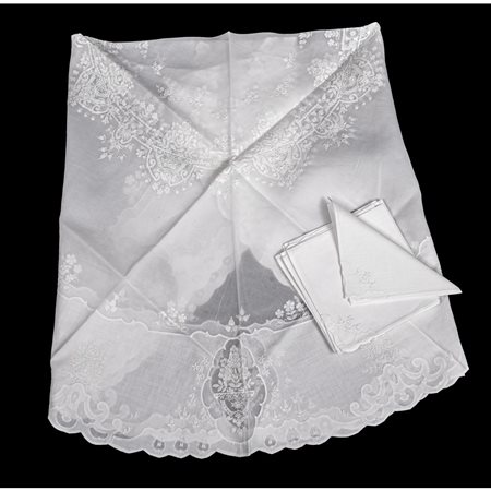 TOVAGLIA circolare con sei tovaglioli in lino bianco