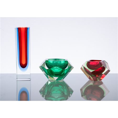 FLAVIO POLI (Attr.le), Due posacenere e un vaso in vetro.