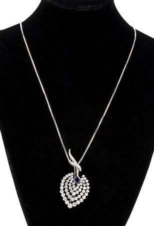 Catenina e spilla in oro, zaffiri e diamanti 