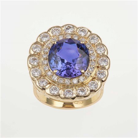 Anello con tanzanite di ct 7.02 con diamanti a contorno