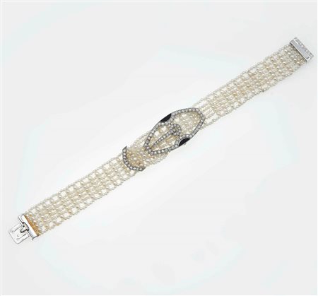 Cartier. Bracciale con seed pearls, diamanti e smalto