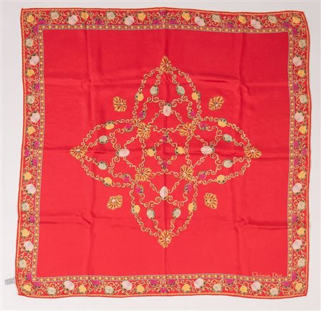 CHRISTIAN DIOR Foulard in seta sui toni del rosso. Cm 83x86. Composizione:...