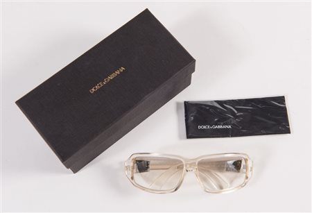 DOLCE&GABBANA Occhiali da sole con montatura trasparente. Recano marchi D&G,...