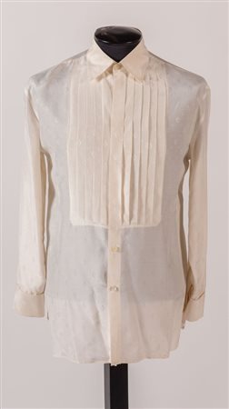 GIANNI VERSACE Camicia in seta color panna logata GV tono su tono. Riporta...