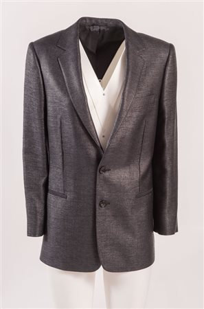 BALENCIAGA Giacca in lana e cotone semi lucida sui toni del nero. Riporta...