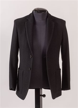 GIORGIO ARMANI Giacca in lana lavorata nera. Riporta taglia 46. Interno...