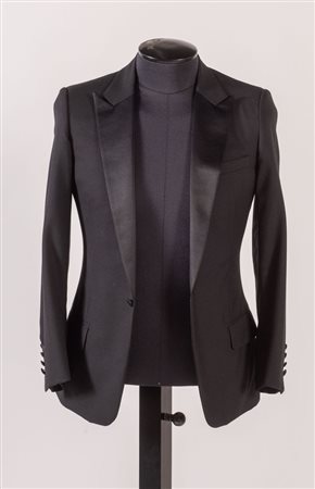 DIOR Giacca in lana sui toni del nero. Riporta taglia 46. Interno rifinito in...