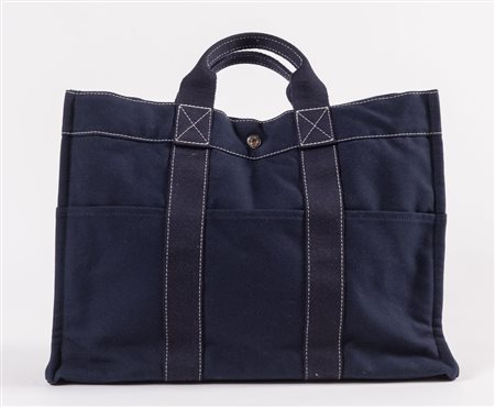 HERMÈS Borsa in tela di cotone blu modello Toto. Cm 31x41,5x12. Altezza con...