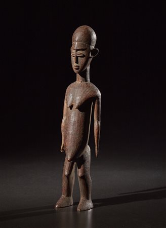  Lobi - Burkina Faso - Figura maschile o Bateba.
Legno duro a patina naturale.
Segni d'uso.