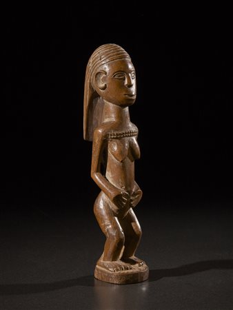  Tabwa - Repubblica Democratica del Congo  - Figura femminile.
Legno duro a patina lucida.
Segni d'uso.