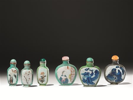 Sei snuff bottles, Cina sec. XIX-XX, in porcellana policroma, tre dalla forma...