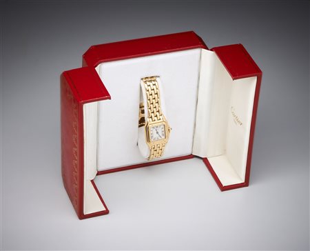 CARTIER  - Orologio Santos in oro giallo 750/1000, movimento al quarzo, maglie mancanti.