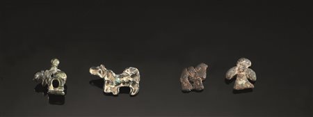 Quattro sigilli raffiguranti animali e un cavaliereMateria e tecnica: bronzo...