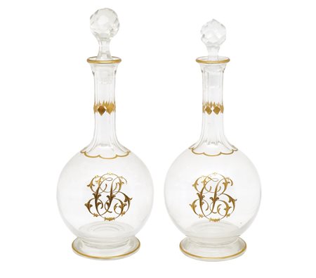 Coppia di bottiglie con decorazione color oro