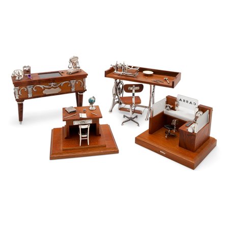 Gruppo di quattro modellini in legno e argento, Italia XX secolo firmati Sacchetti