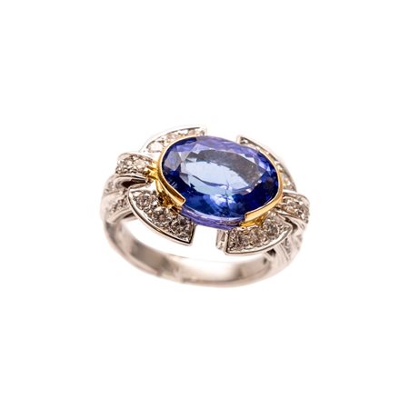 ANELLO in oro bianco e giallo 18 KT con brillanti e tanzanite