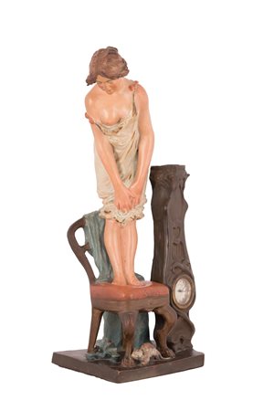  
Scultura in terracotta con orologio XX secolo
 altezza cm 56