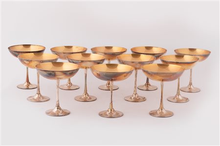  
12 coppette da gelato in argento vermeil 
 cm 11,5x10,5; peso g 1900 circa