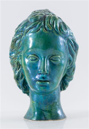 TRAMONTI Testa di fanciulla in ceramica policroma sui toni del verde. Anni...