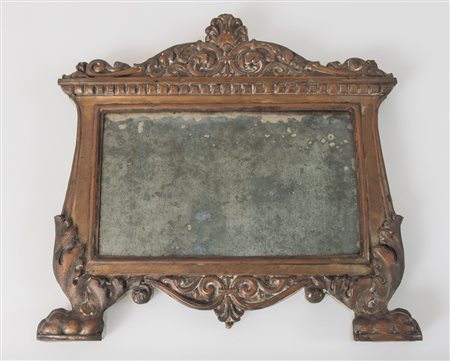 Specchiera ricavata da cantaglorie in lamierino sbalzato con tracce di...