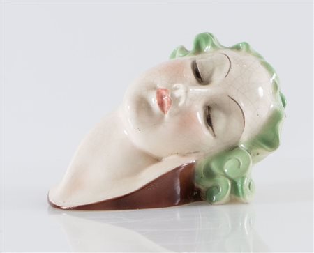 MANIFATTURA NOVE di BASSANO Testa in maiolica invetriata. Manifattura recente...