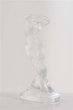 LALIQUE, Parigi. "Danceur". Scultura in cristallo. Reca firma. Cm 23,5x12.