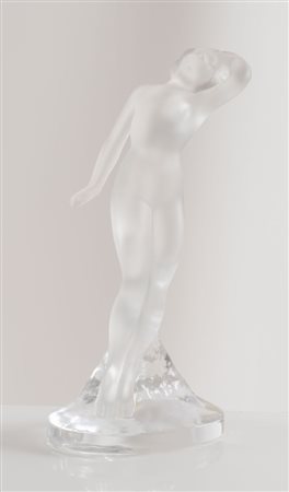 LALIQUE, Parigi. "Danceur". Scultura in cristallo. Reca firma. Cm 24x12.