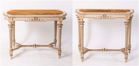 Lotto composto da tavolino e consolle di gusto eclettico, laccati in avorio...
