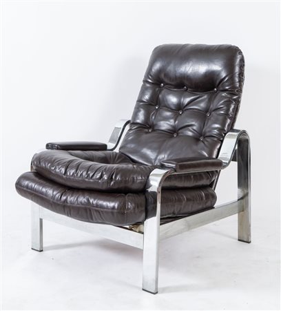 SELIG Poltrona con struttura in metallo cromato e seduta in pelle. Prod....