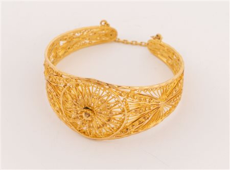 Manifattura artigianale, Libia. Bracciale semi rigido in oro giallo 18k