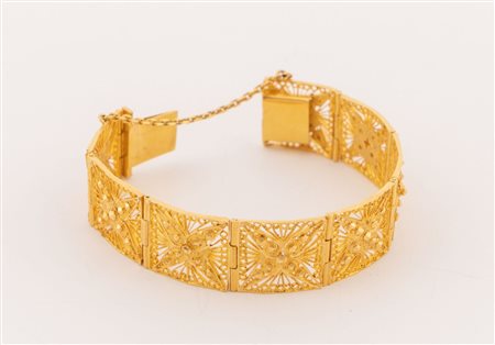Manifattura artigianale, Libia. Bracciale a nastro in oro giallo 18k