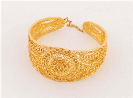 Manifattura artigianale, Libia. Bracciale semi rigido in oro giallo 18k