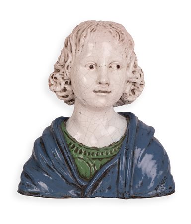 Manifattura toscana del XIX secolo ( - ) 
Busto di fanciullo in terracotta maiolicata 
 cm 40x36