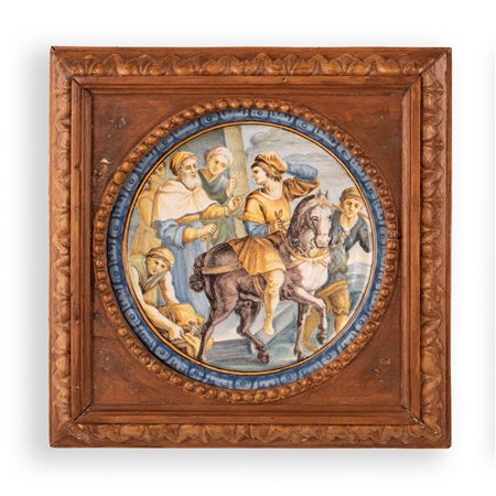 Manifattura Gentili, Castelli, metà del XVIII secolo ( - ) 
Tondo in maiolica decorata in policromia con la rappresentazione della parabola della partenza del figliol prodigo in cornice lignea scolpita 
 Ø cm 18; con cornice cm 25x25