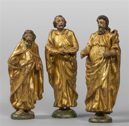 Evangelisti, tre sculture in legno intagliato e 