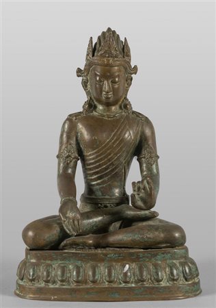 Divinità seduta, scultura in bronzo brunito, 