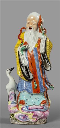 Scultura in porcellana raffigurante saggio con 