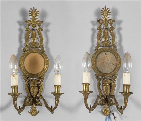 Coppia di apliques in stile Carlo X in bronzo 