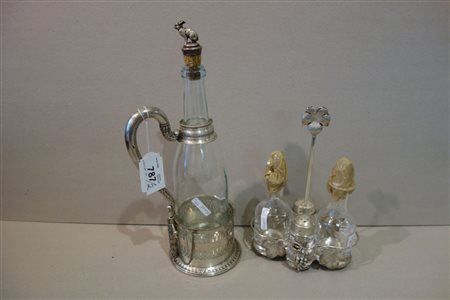 # Portabottiglie in argento e oliera in argento