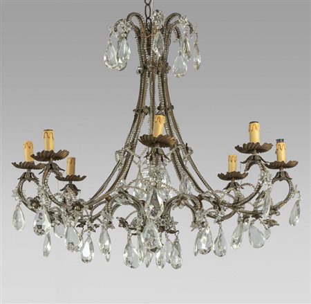 Lampadario in bronzo e vetro a otto luci decorato 