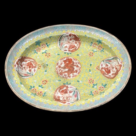 Cina piatto in porcellana,fondo giallo con 